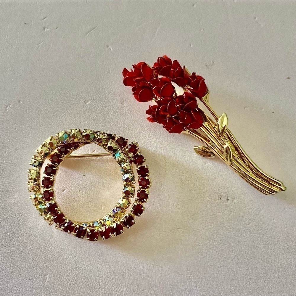 TWO GOLD TONE BROOCHES WITH RHINESTONES